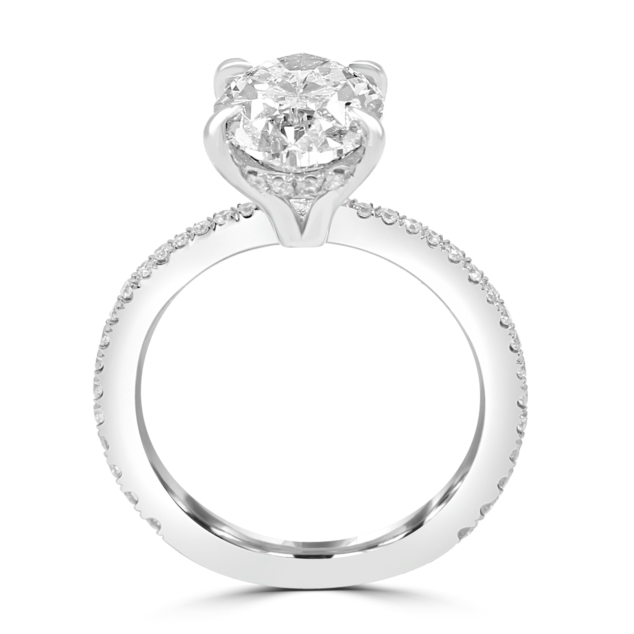 Tapered Oval diamond engagement ring with pave diamonds on the band. Front view