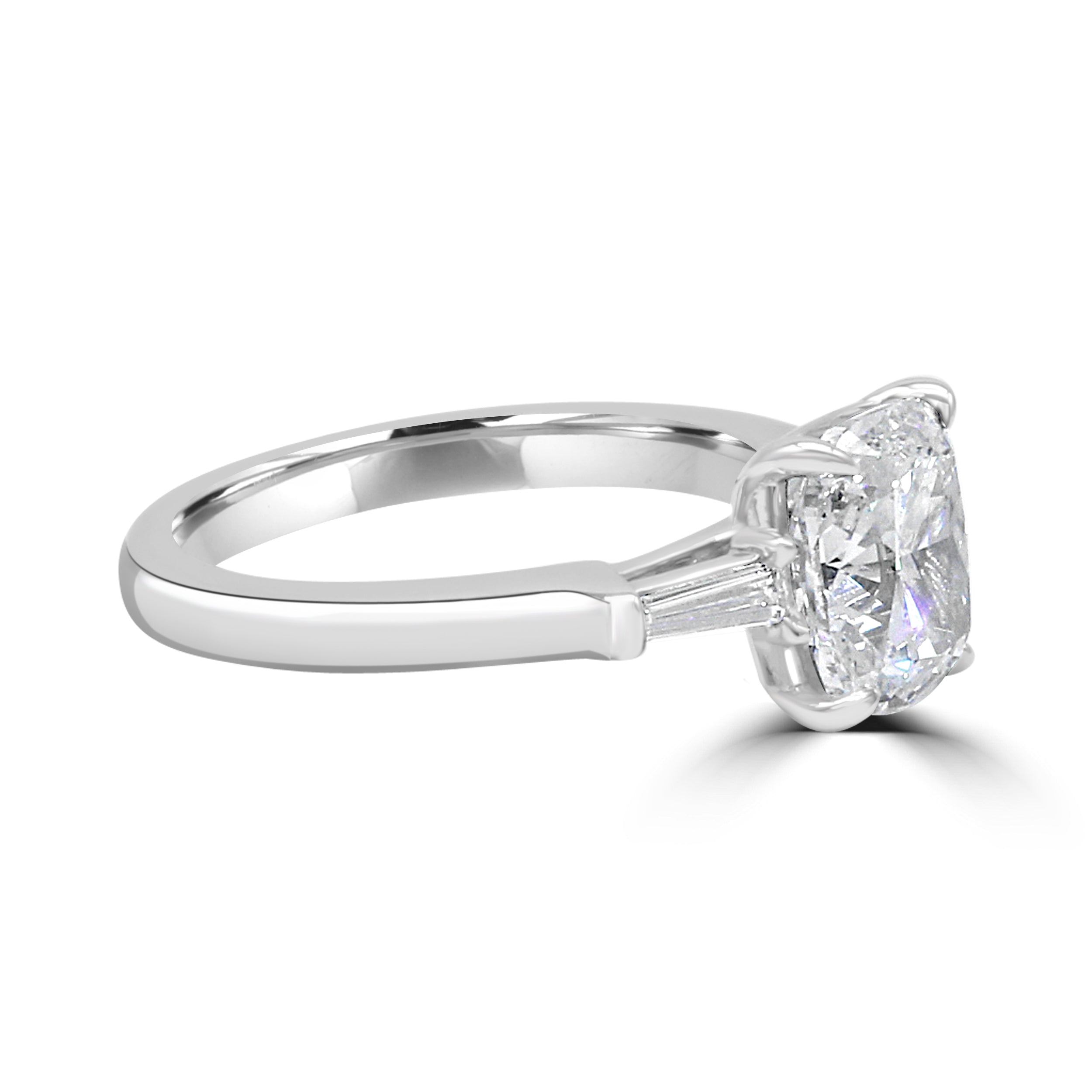 cushion cut diamond and tapered baguettes.
