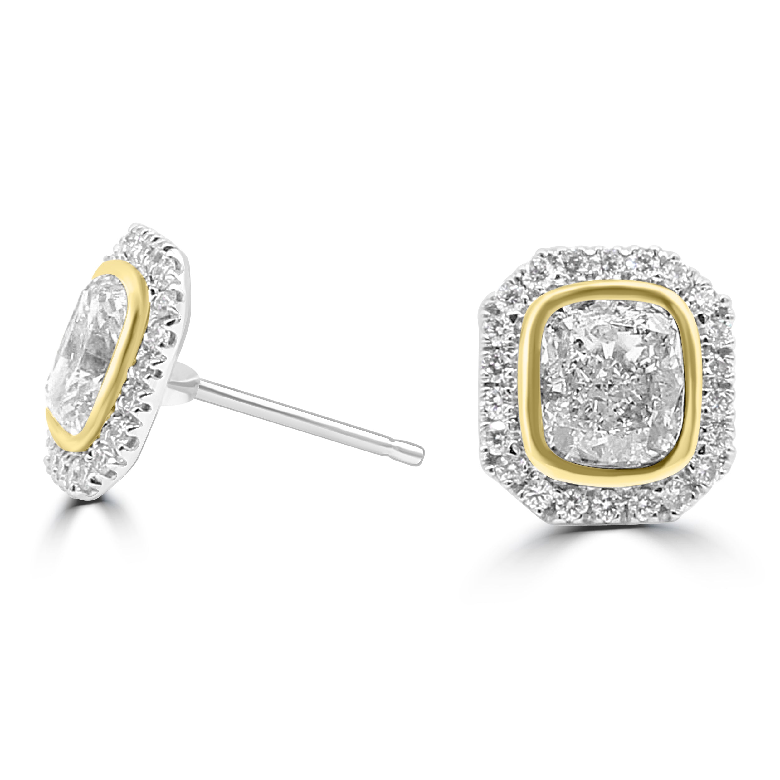 Cushion cut diamond set bezel set in yellow gold with pave diamond halo on white gold. earrings