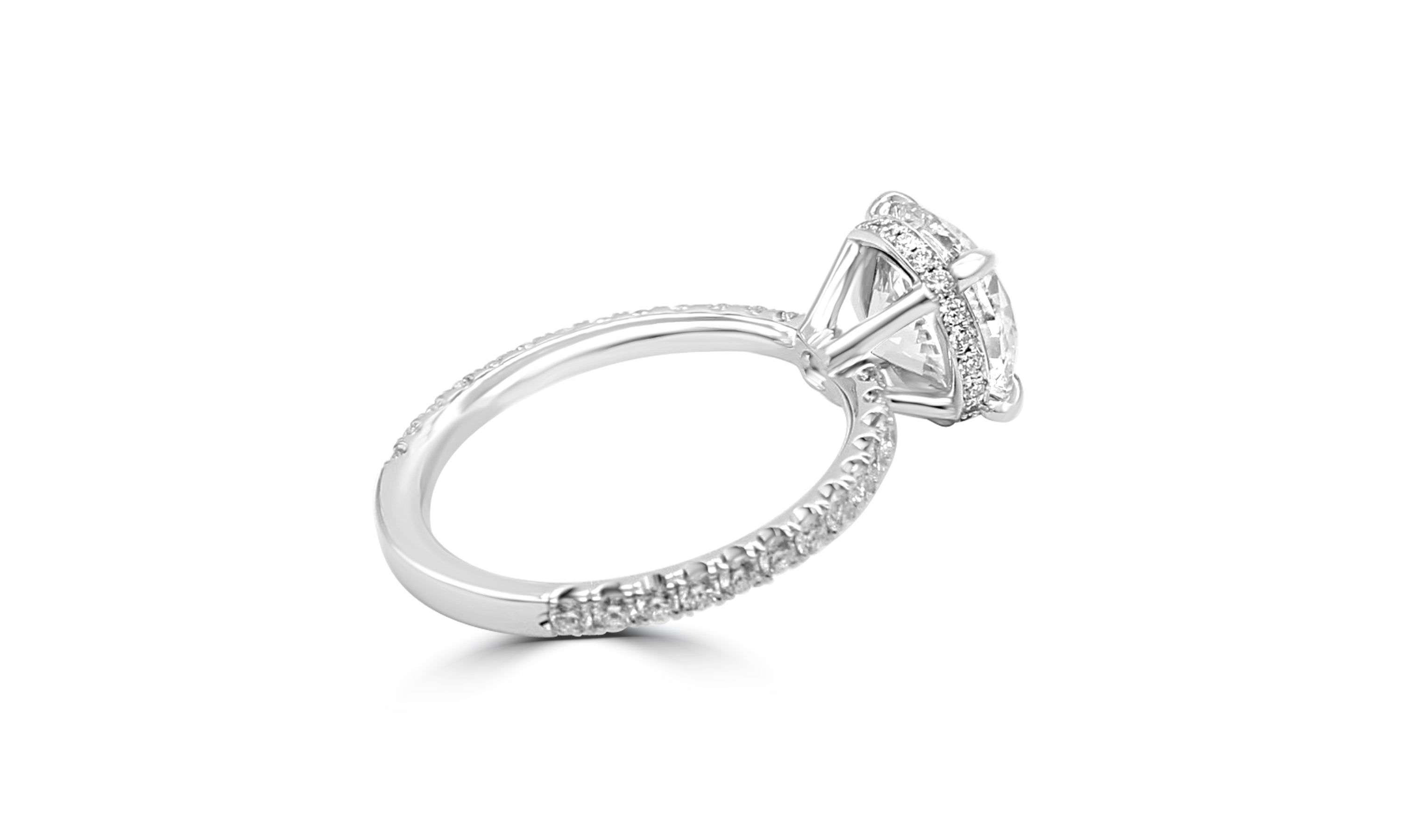 diamond ring with a hidden band of diamonds revealed from the side.