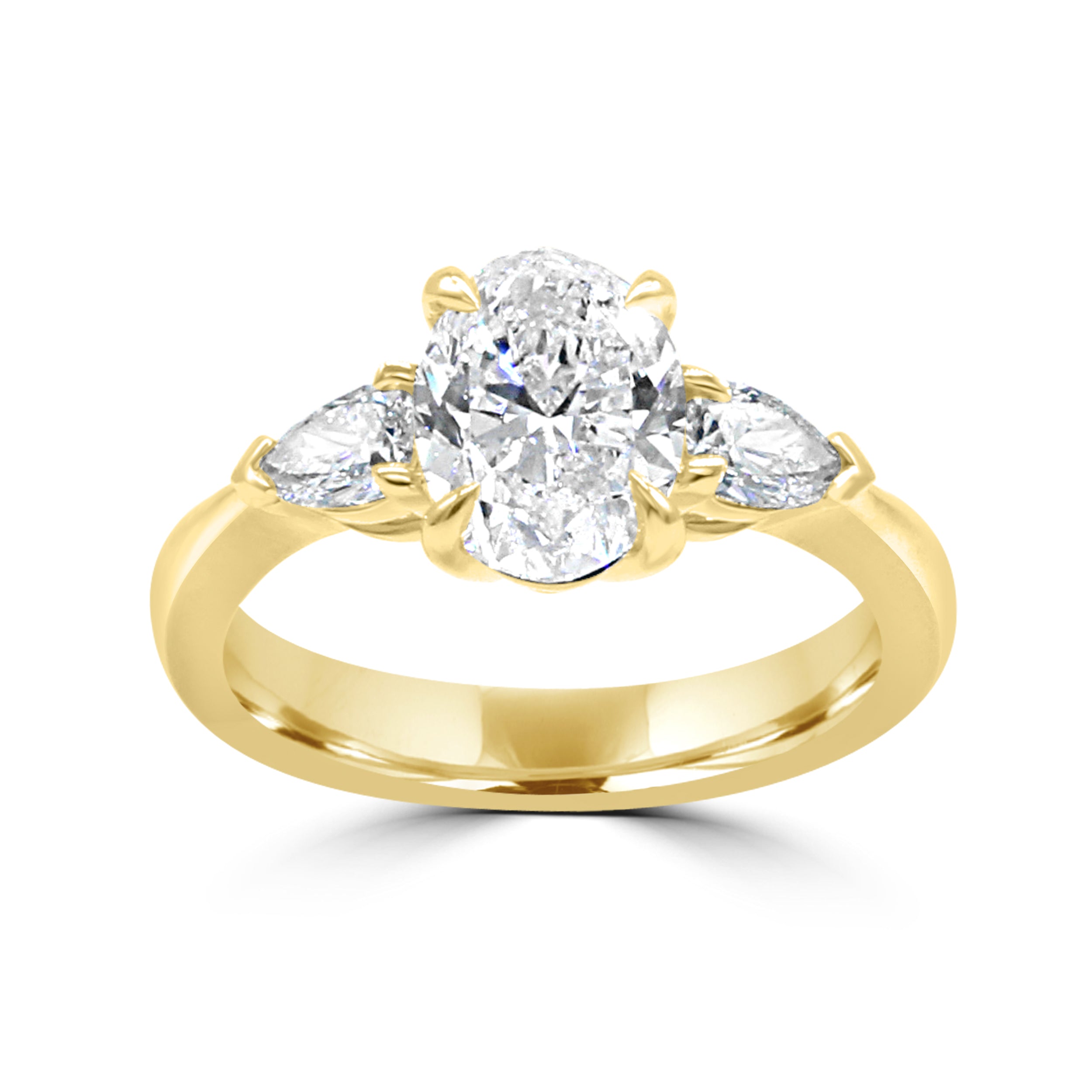 oval diamond with two pear side stone diamond ring