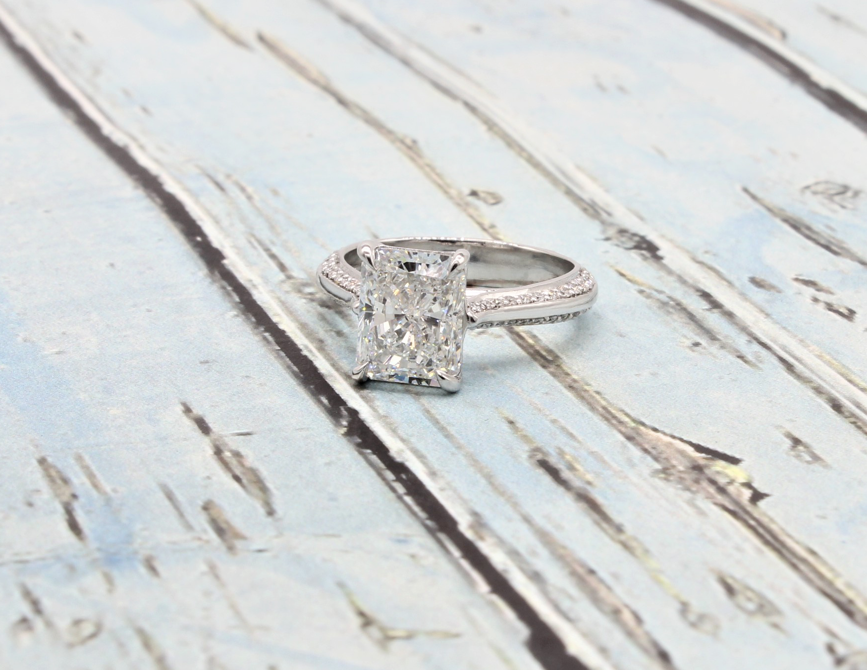 Radiant cut diamond engagement ring. Platinum