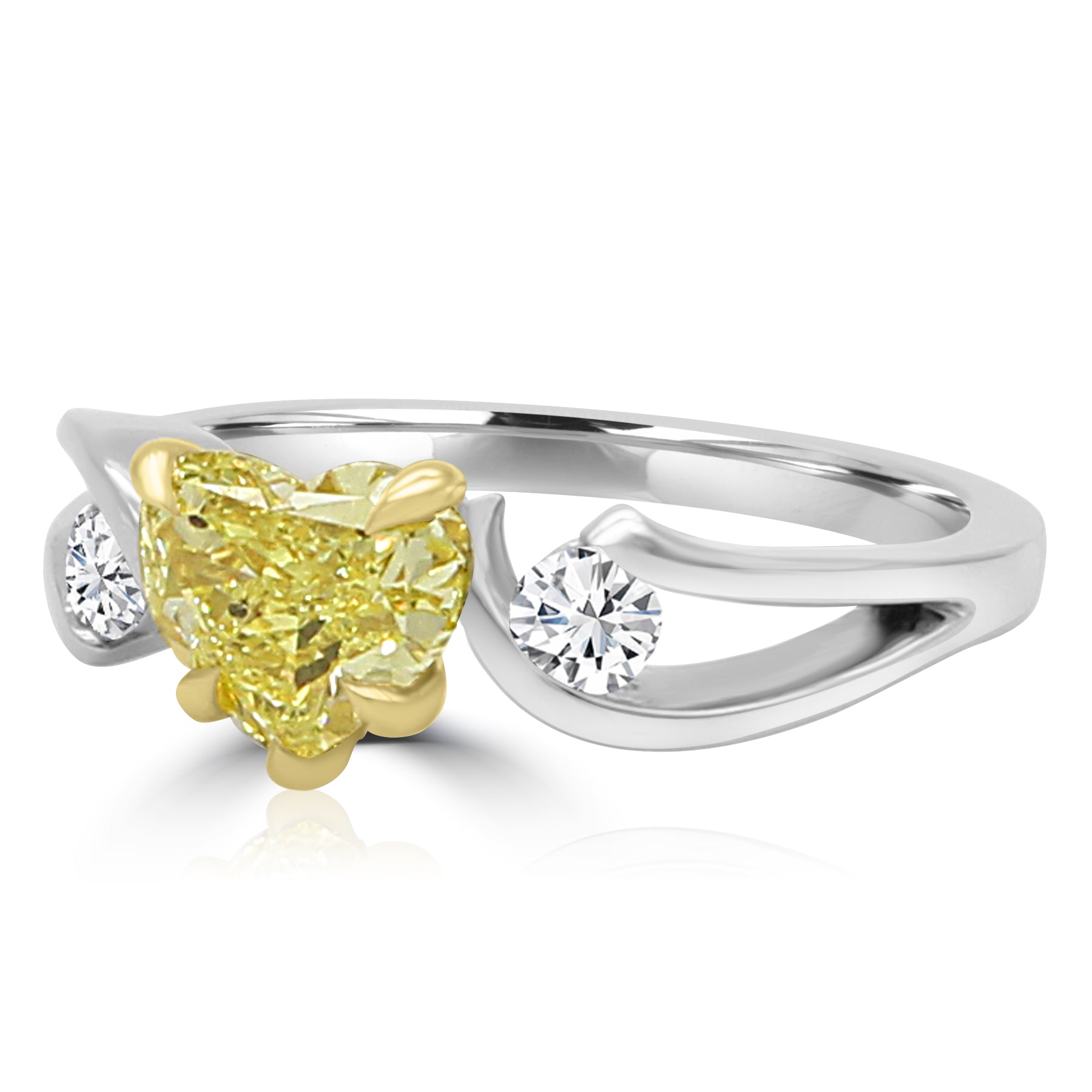 rare canary yellow heart-shaped diamond ring, with two round diamonds on the sides