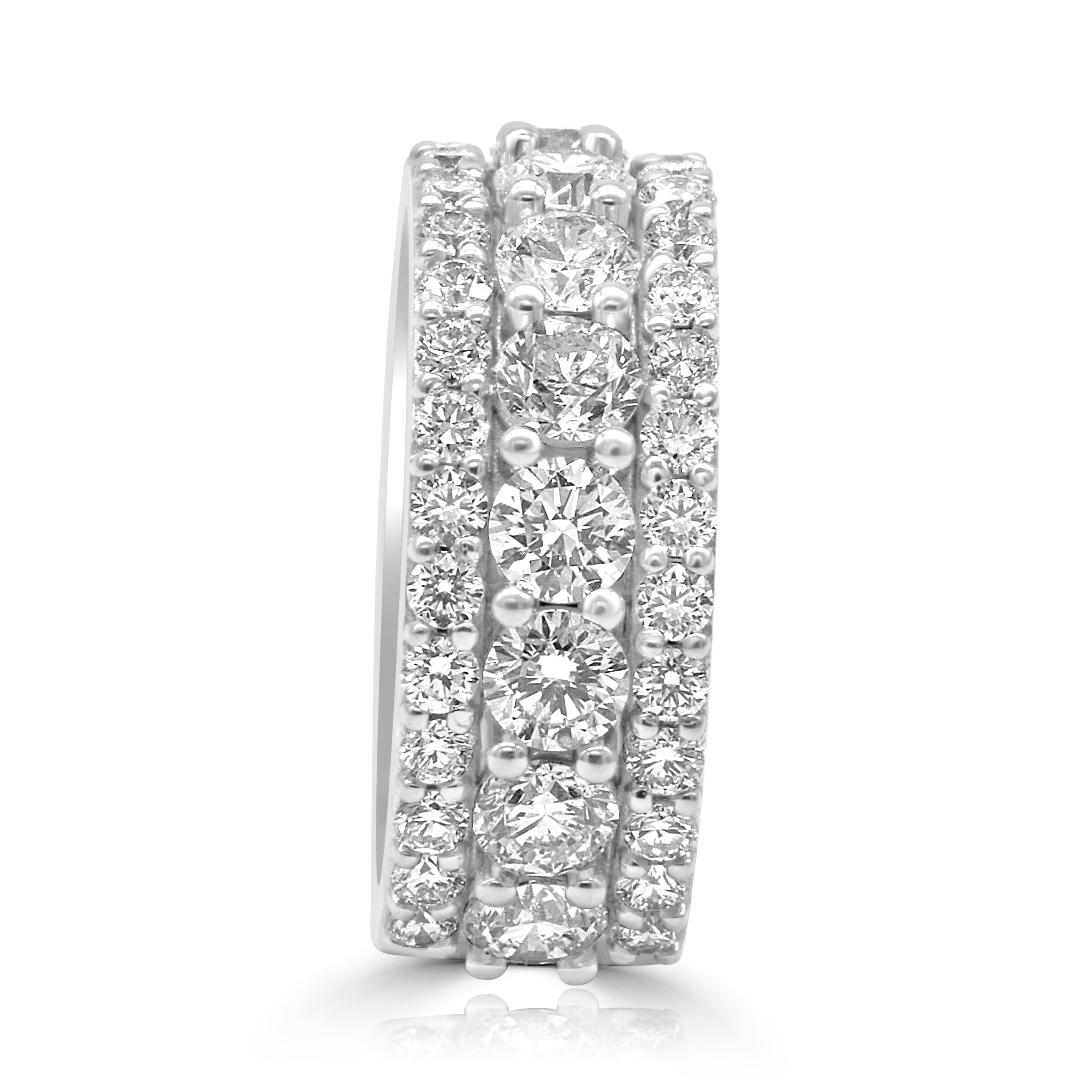wedding band features three rows of diamonds