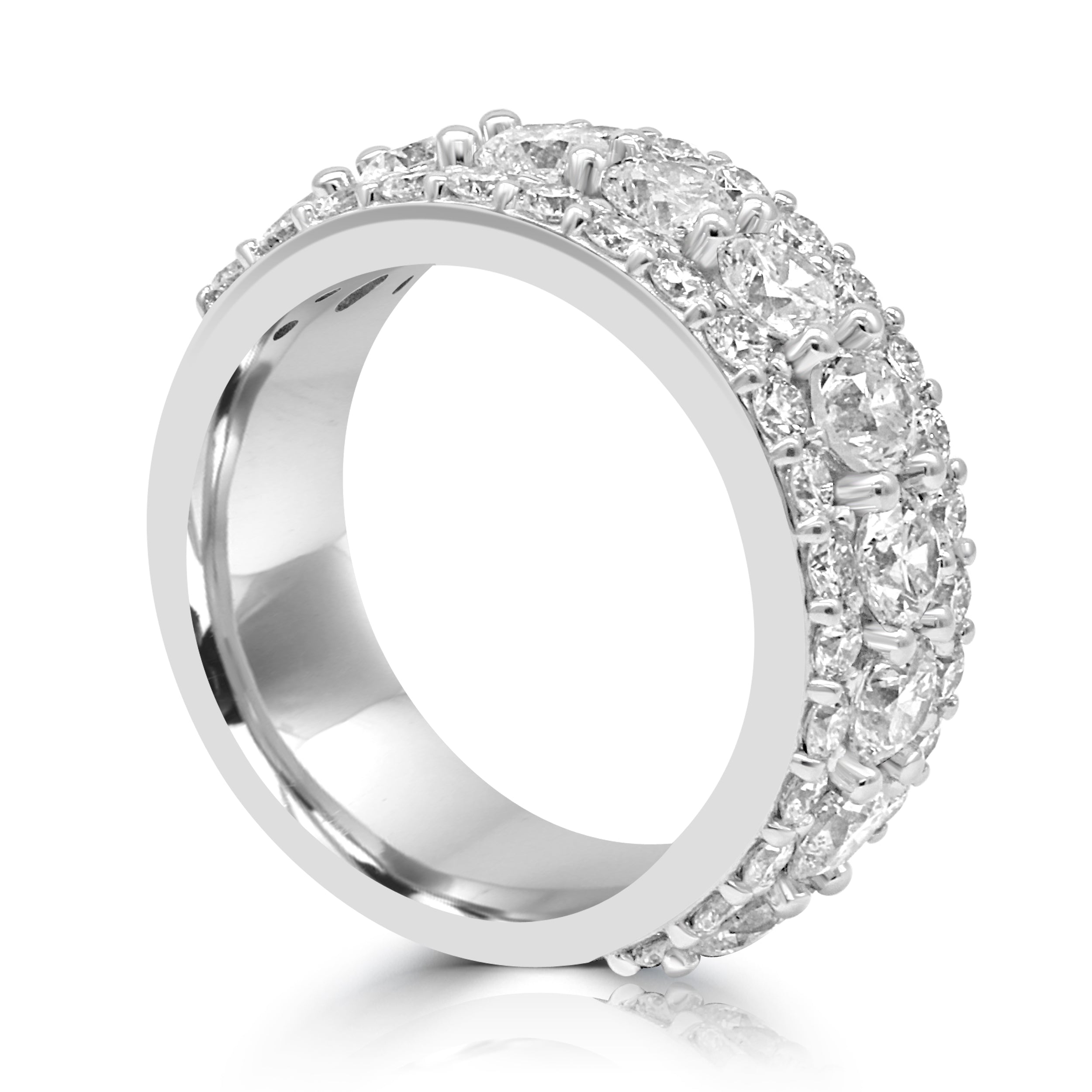 wedding band features three rows of diamonds