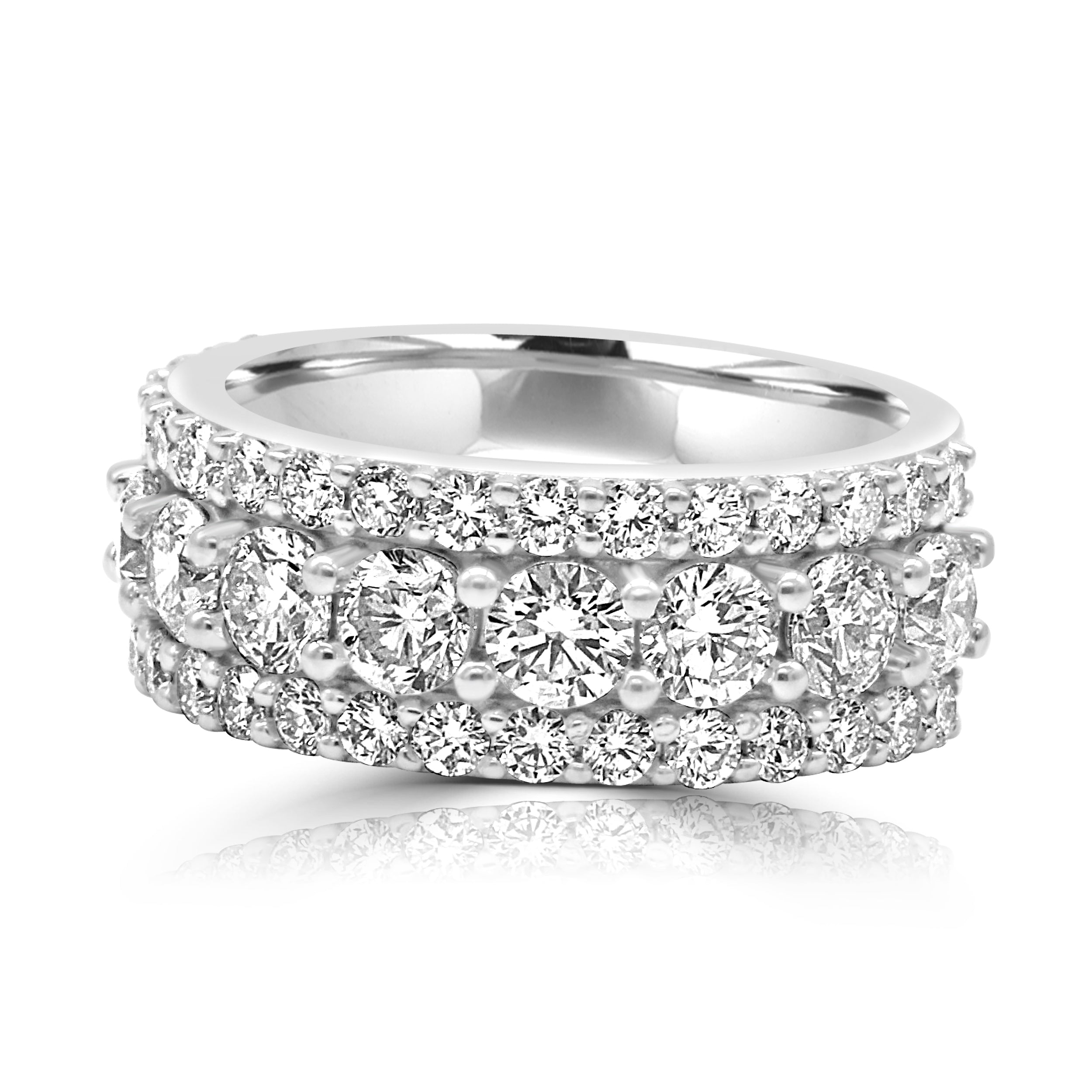 wedding band features three rows of diamonds