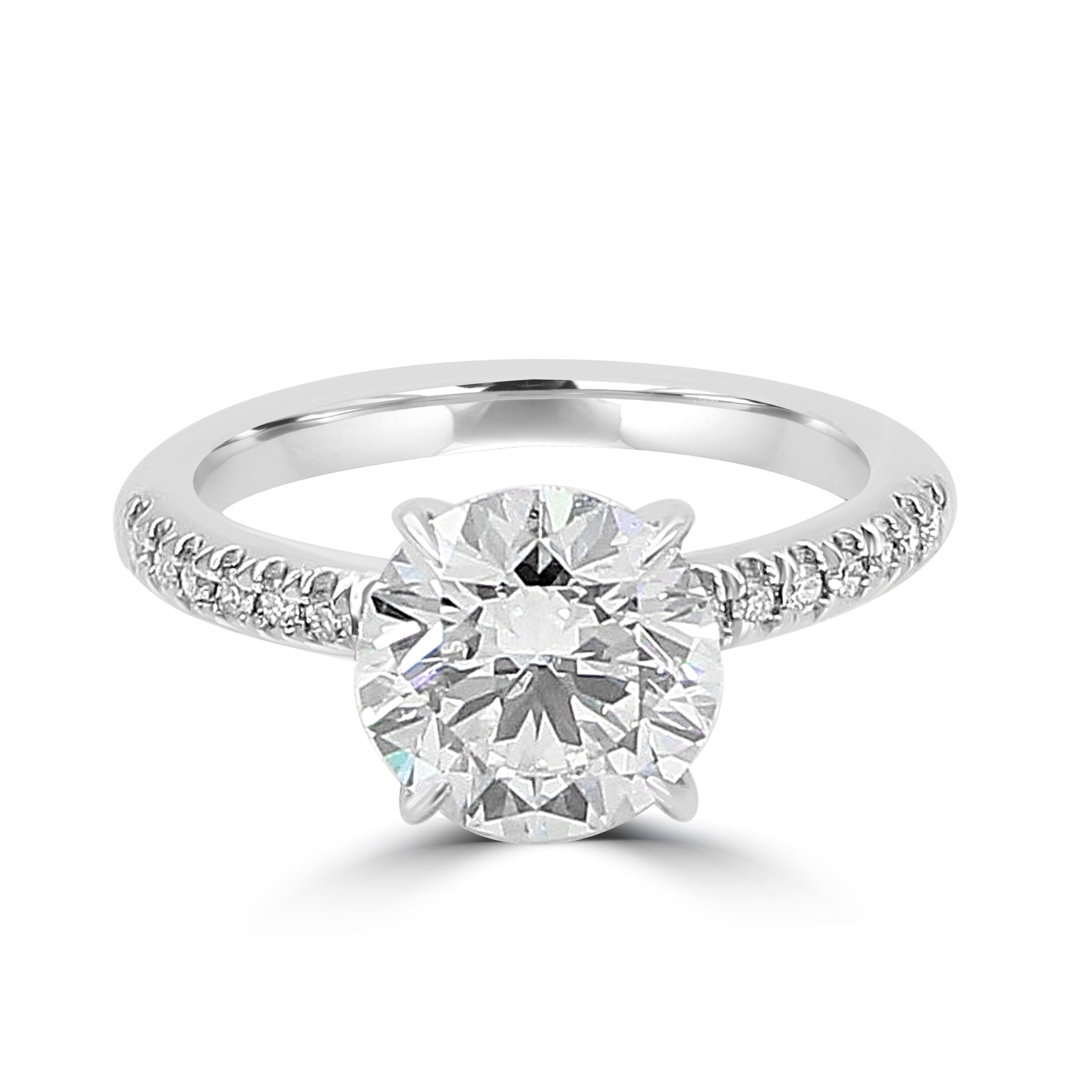 diamond ring with a hidden band of diamonds revealed from the side.