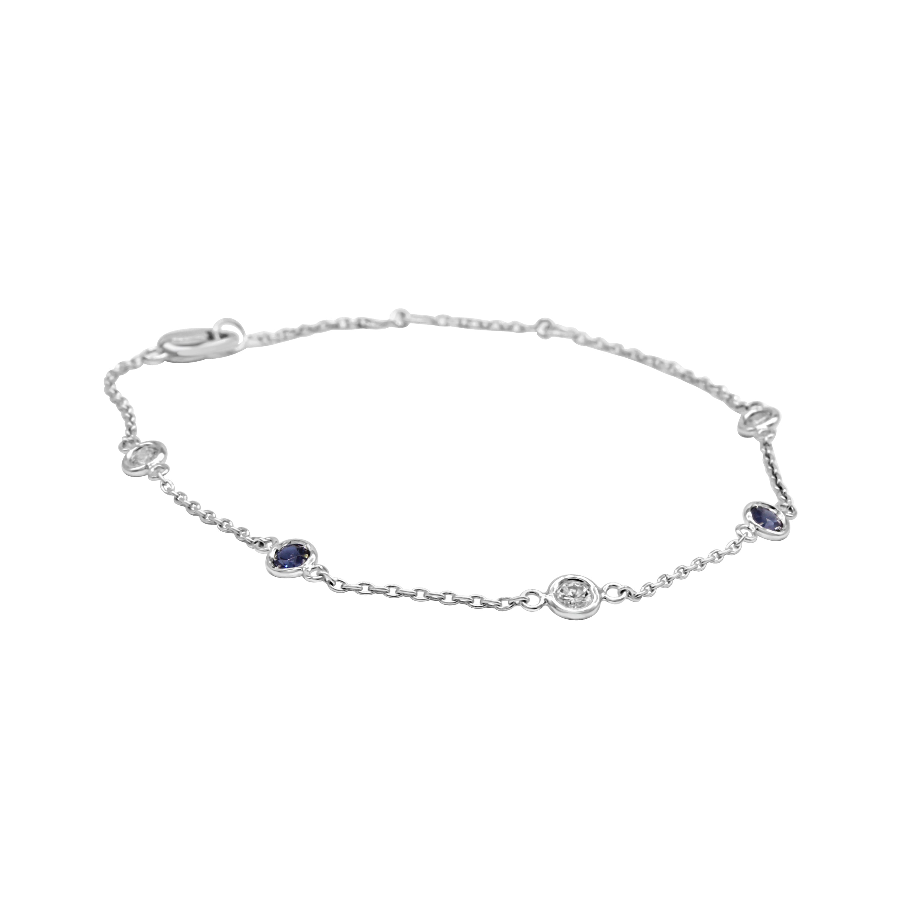 bracelet features bezel-set diamonds and sapphires