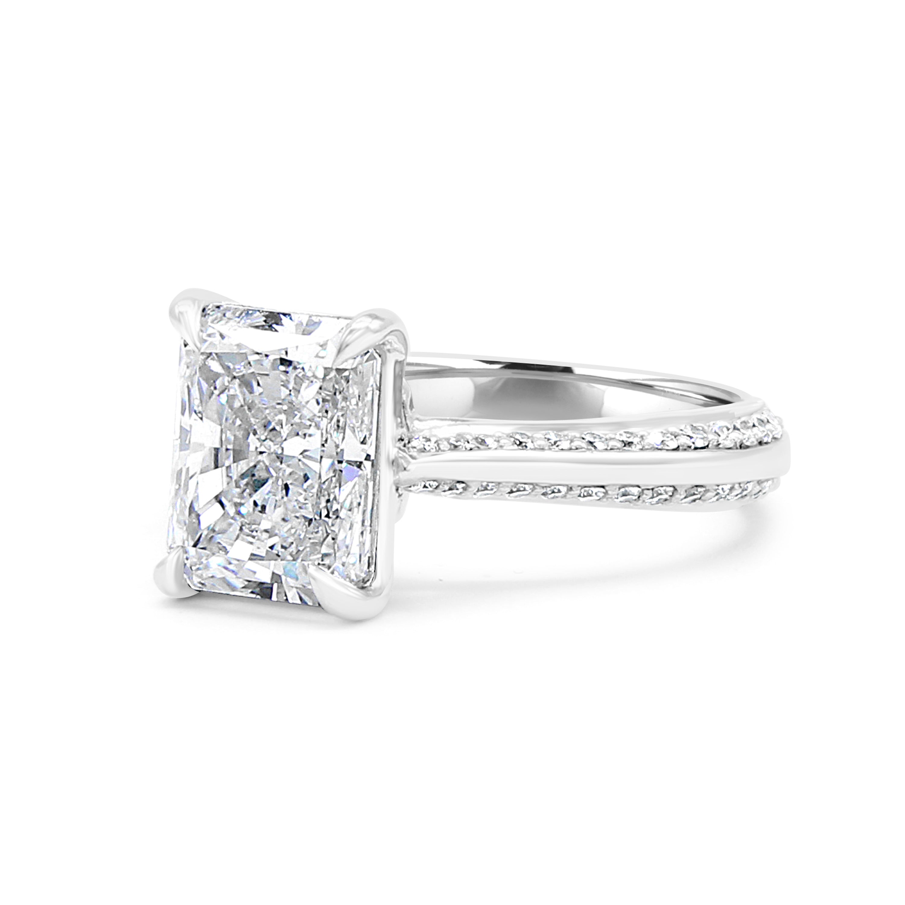 Radiant cut diamond engagement ring. Platinum