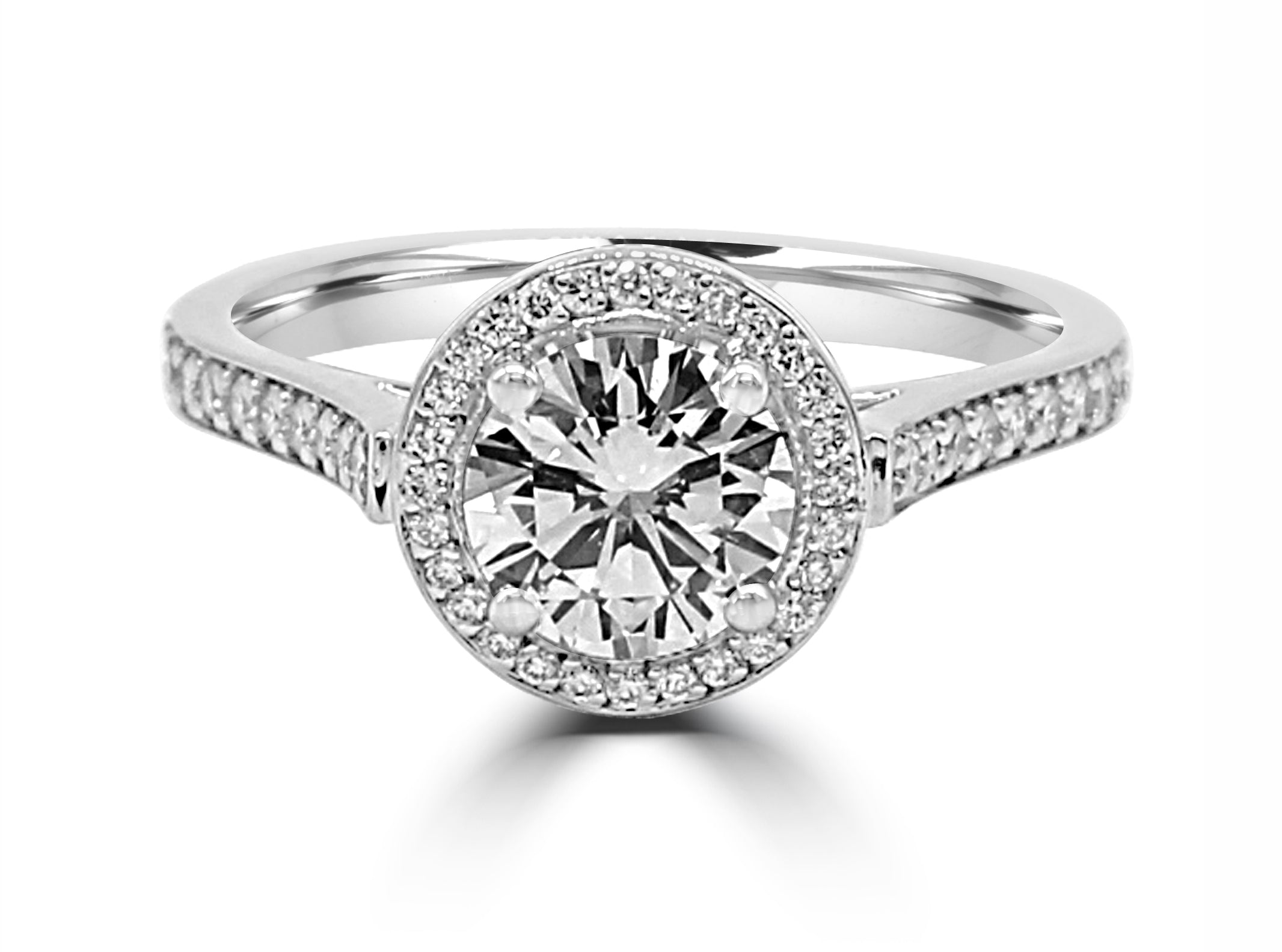 ring with a 3 ct diamond in the center, surrounded by a halo and pave diamonds, and has a unique hidden design underneath