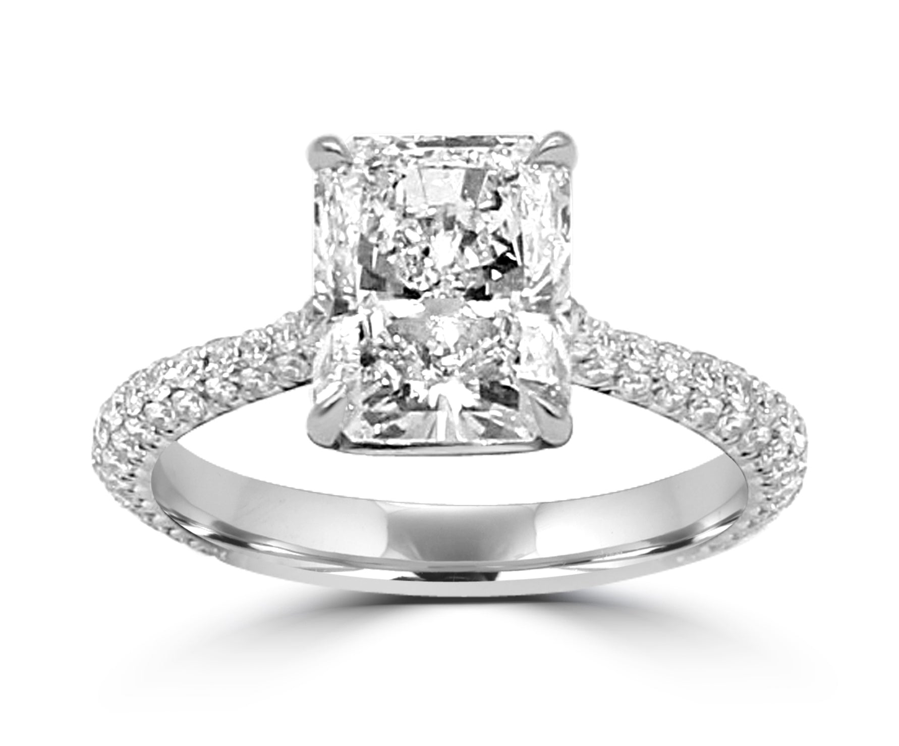 Diamond engagement ring. Center Radiant cut natural diamond, along with 3 rows of micro-pave diamonds on the band