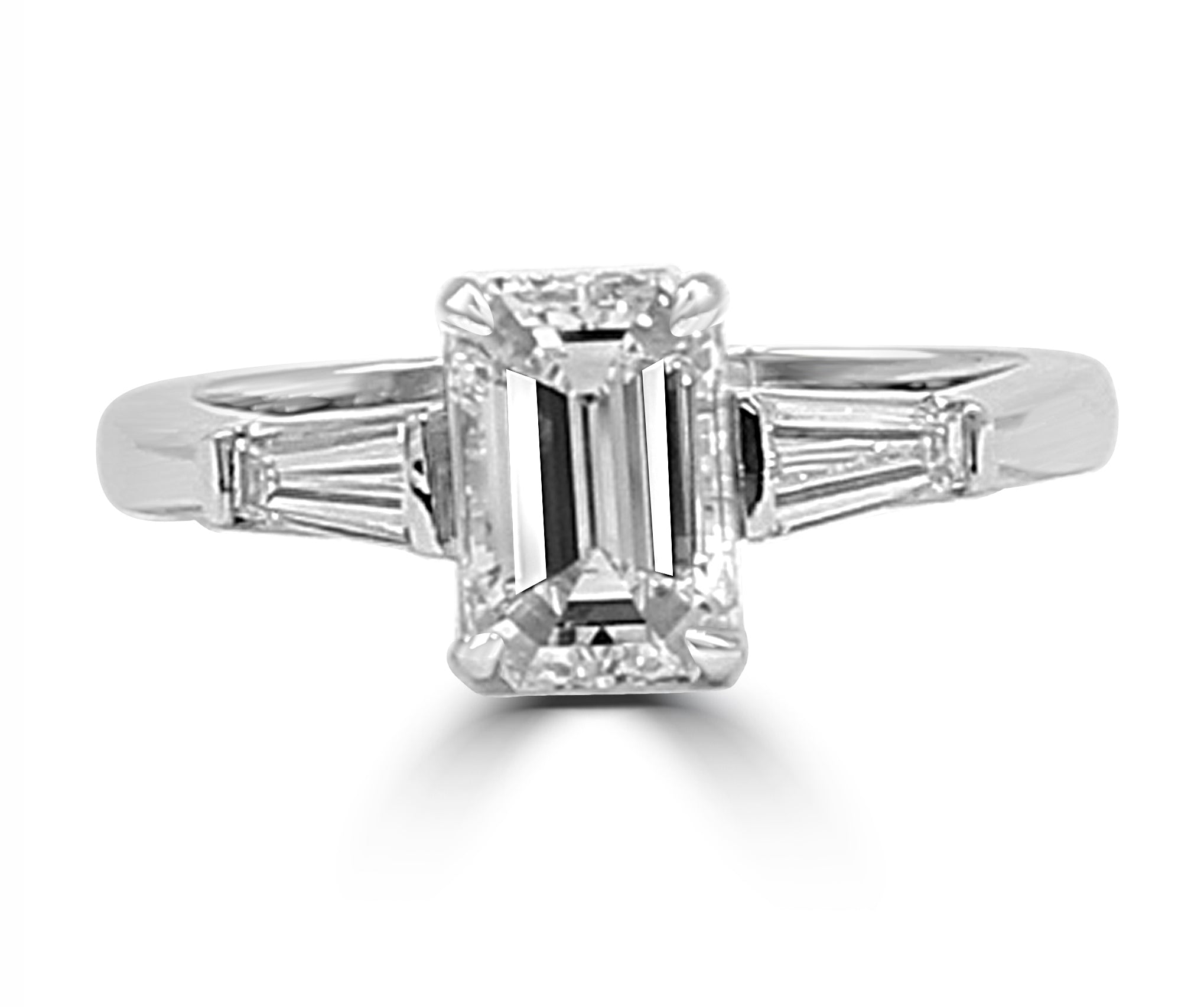 emerald-cut engagement ring featuring tapered baguette diamonds on each side.