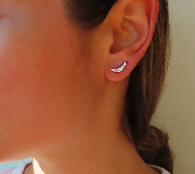 Crescent Moon diamond earrings on model
