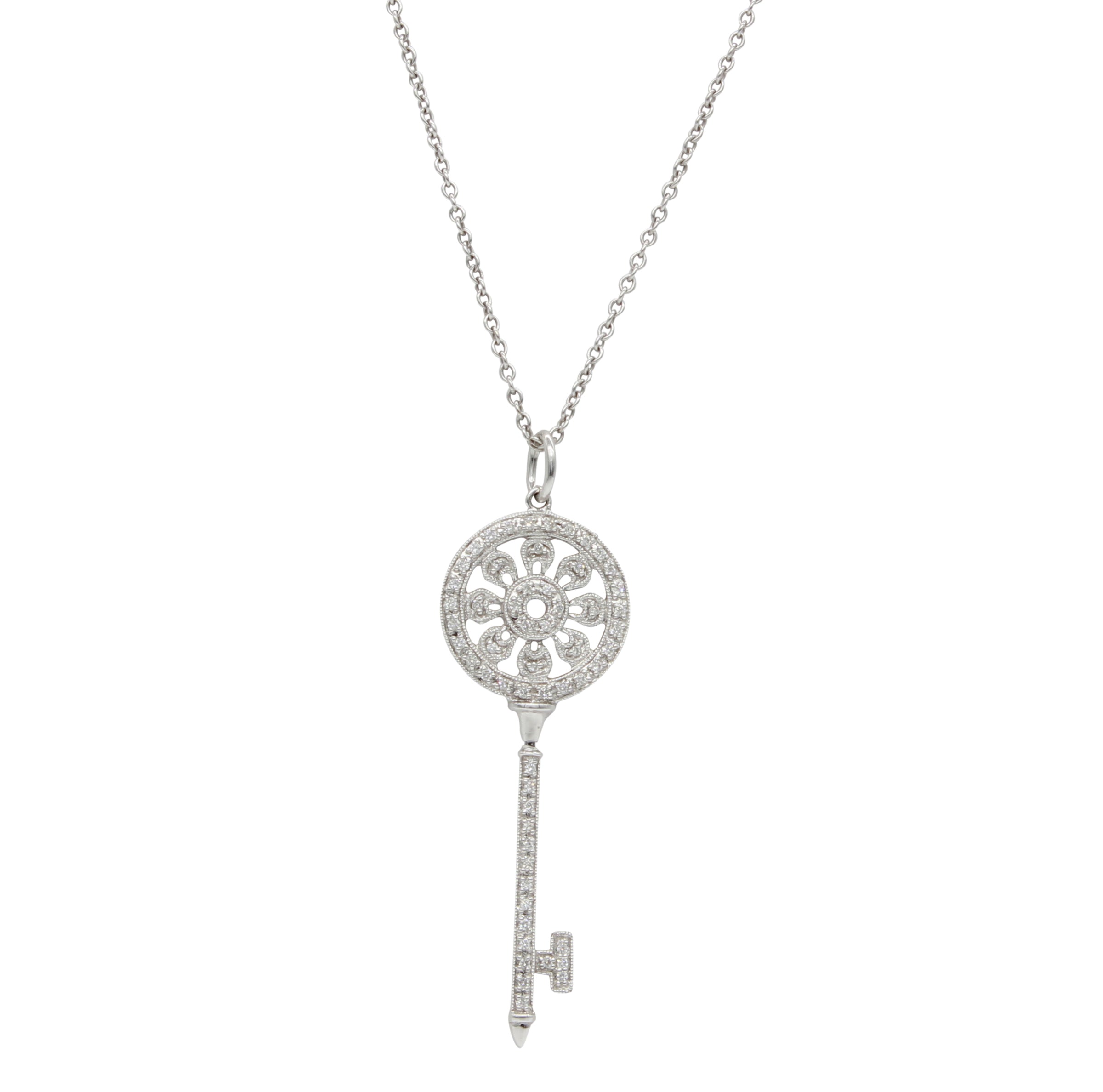 Key pendant with tiny sparkling diamonds
