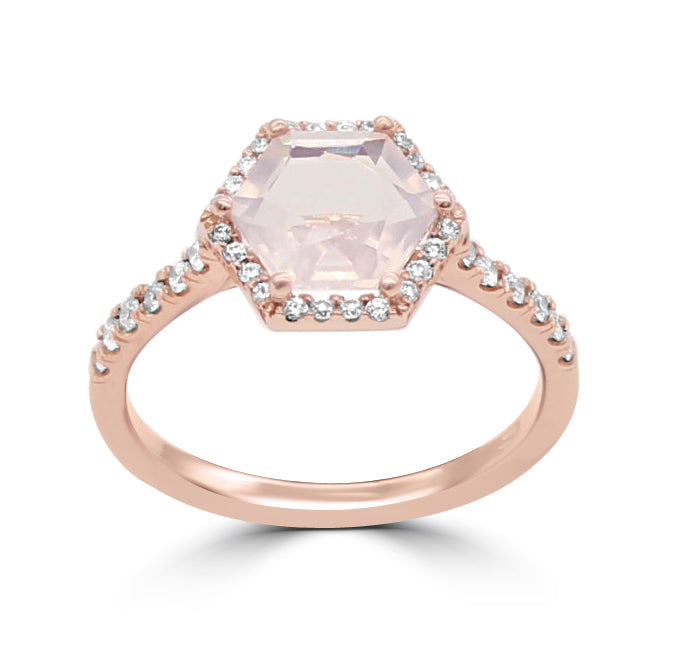 Rose Quartz center stone with white round diamond hexagon halo, and a half way diamond shank