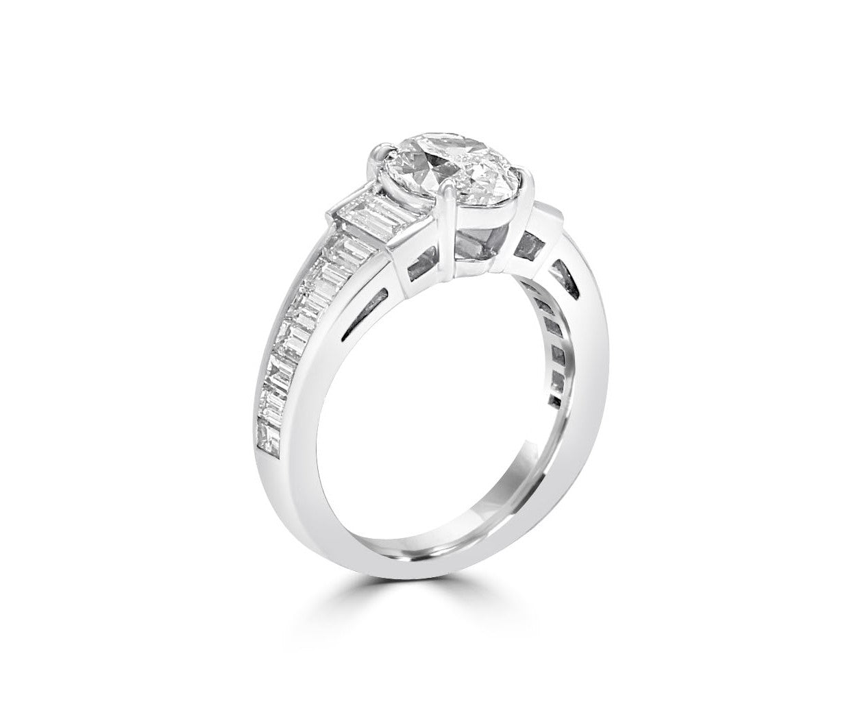 Baguette diamononds set in steps with center Oval diamond