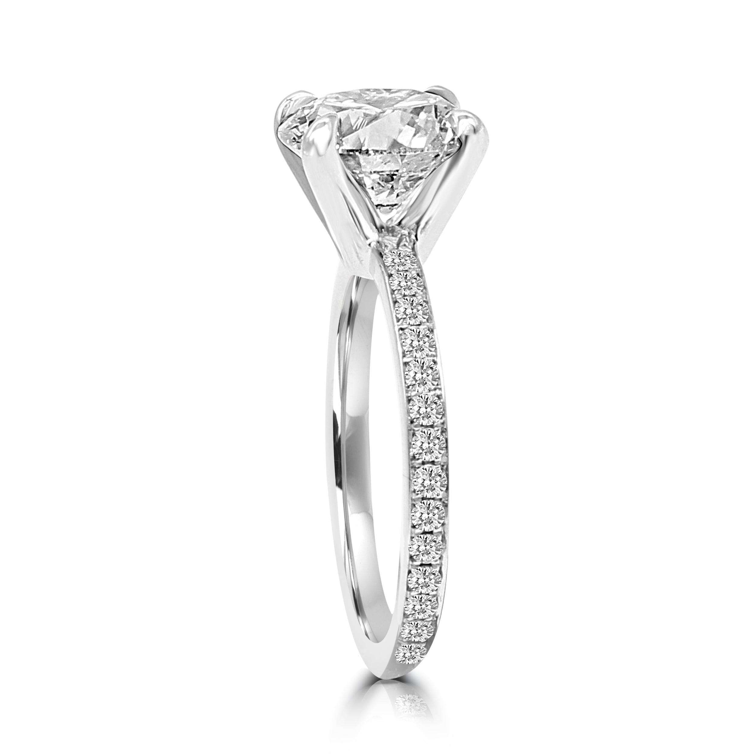 Center diamond with open setting to show all angles. Pave Band.