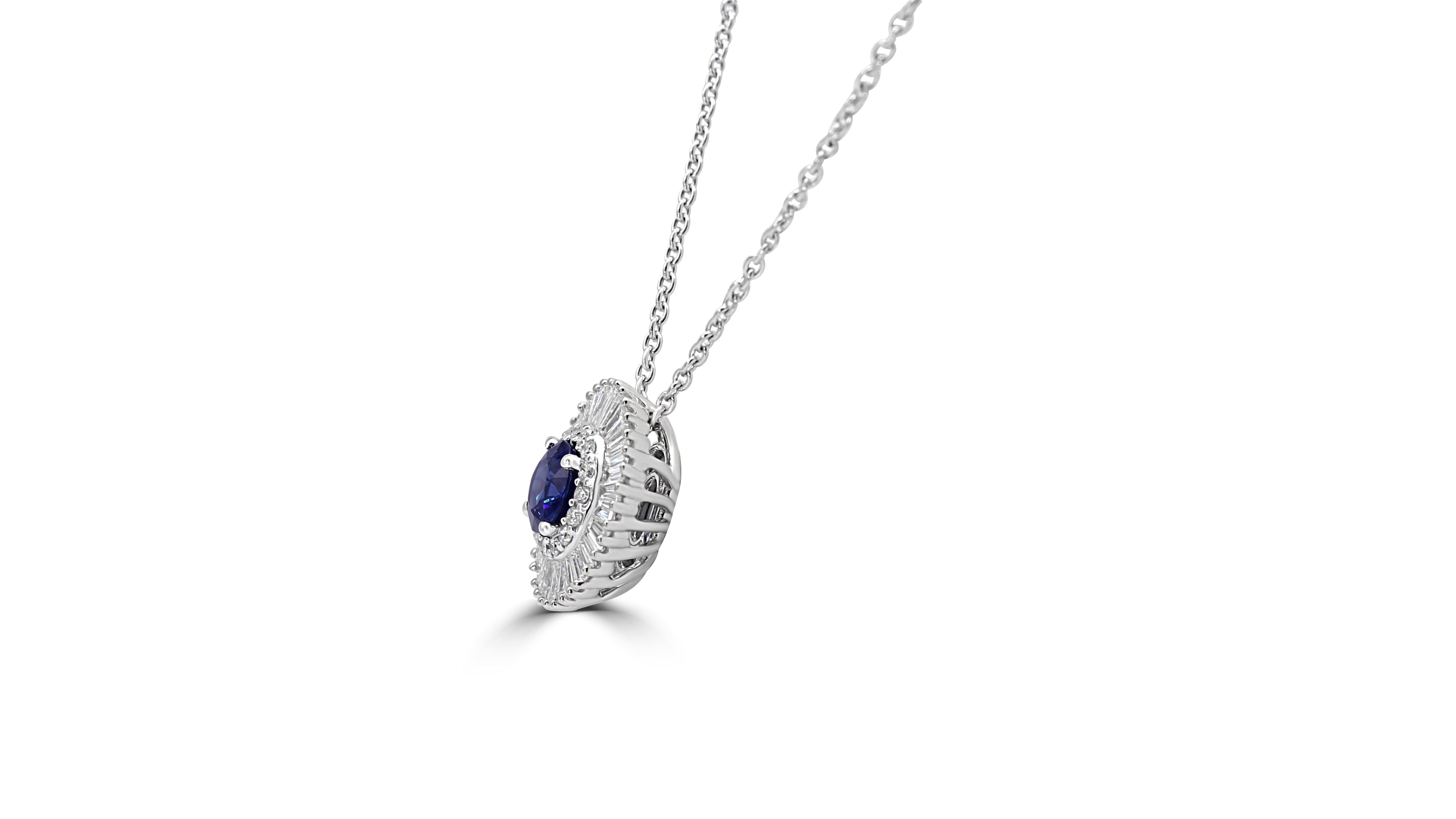 Sapphire is enveloped by bright diamond Baguettes. Diamond necklace