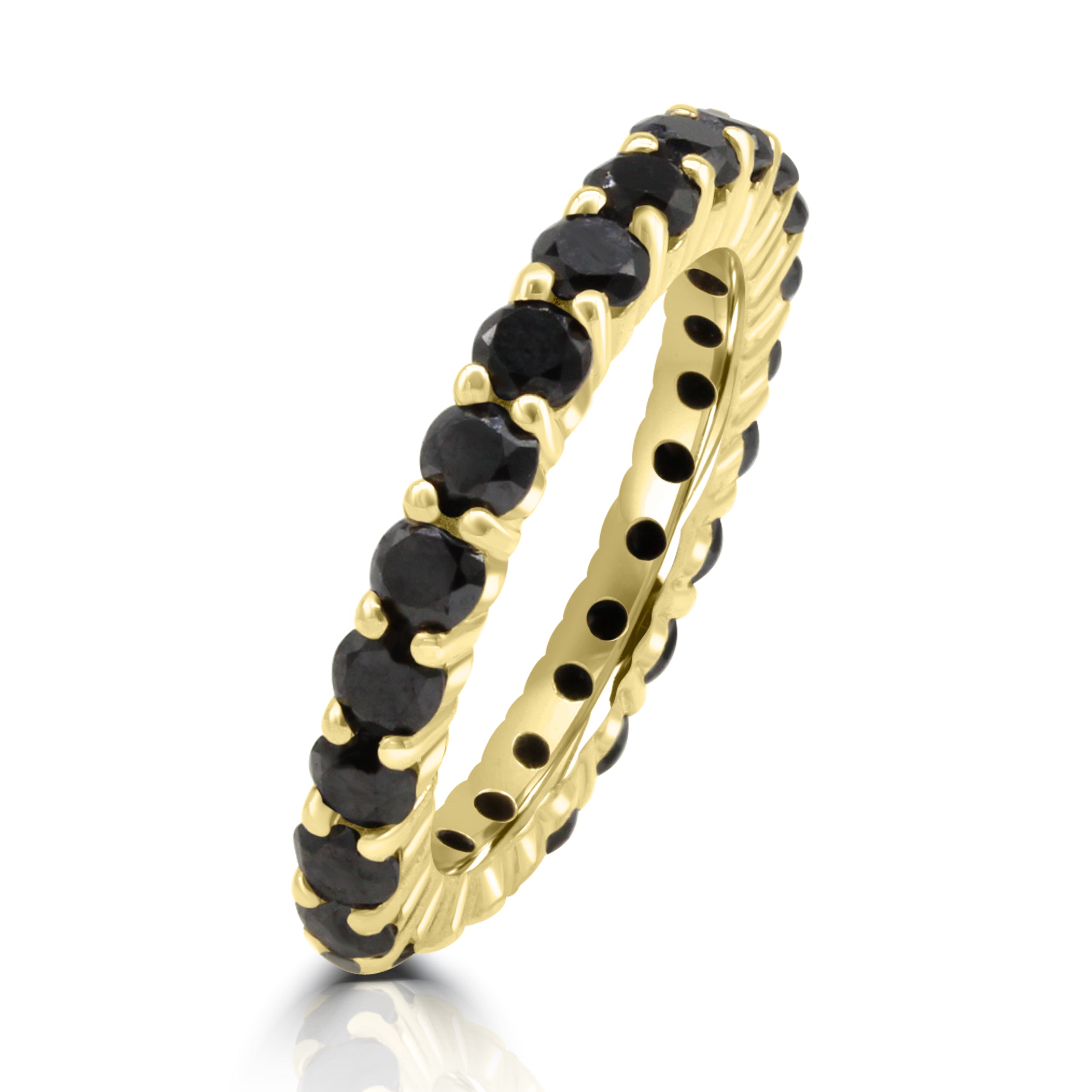 Eternity band encrusted with black diamonds shared prongs. Standing Angle