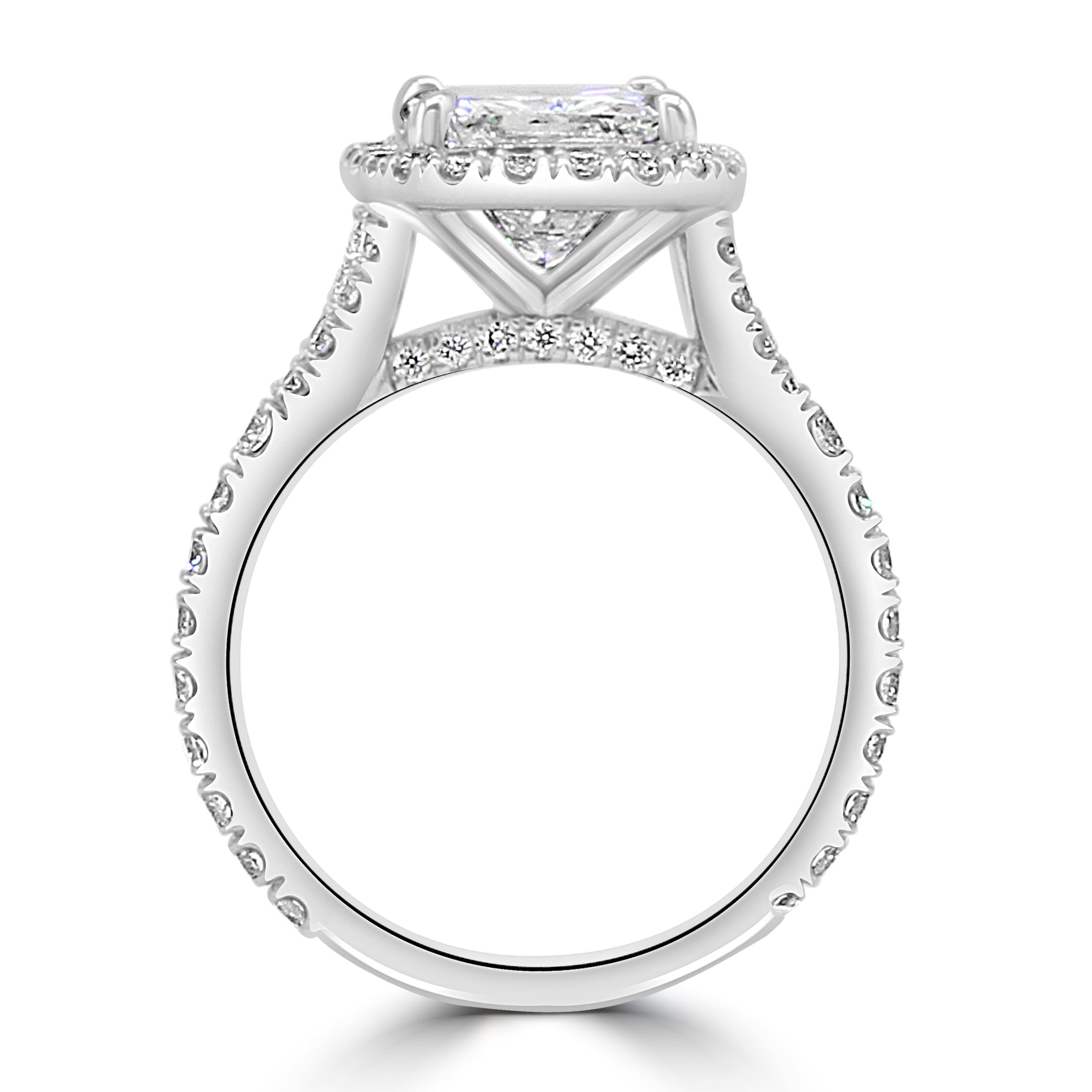 cushion cut diamond with halo and hidden diamonds under with pave diamond band