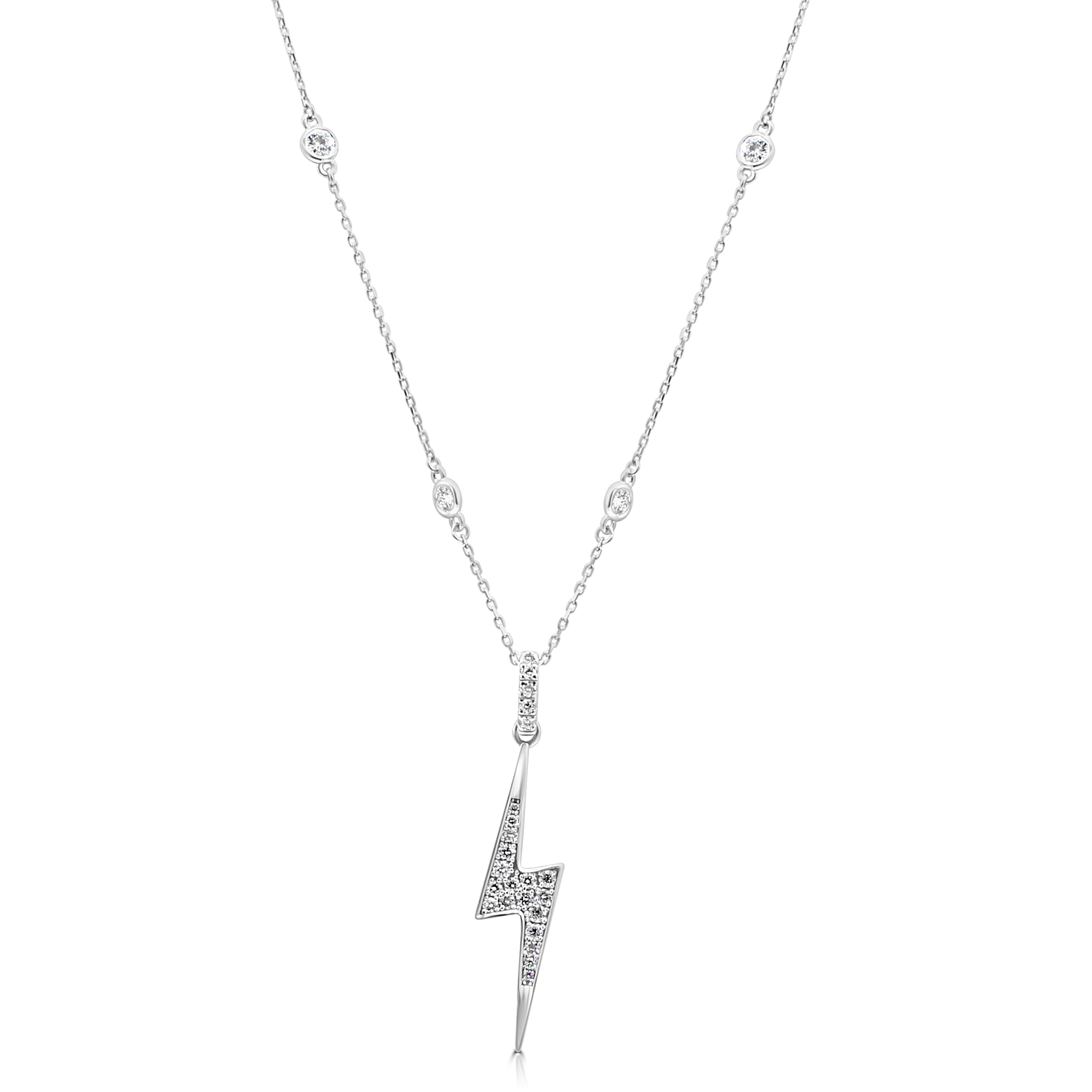 A diamond-encrusted lightning bolt pendant on a delicate chain with evenly spaced bezel-set diamonds, set in white gold