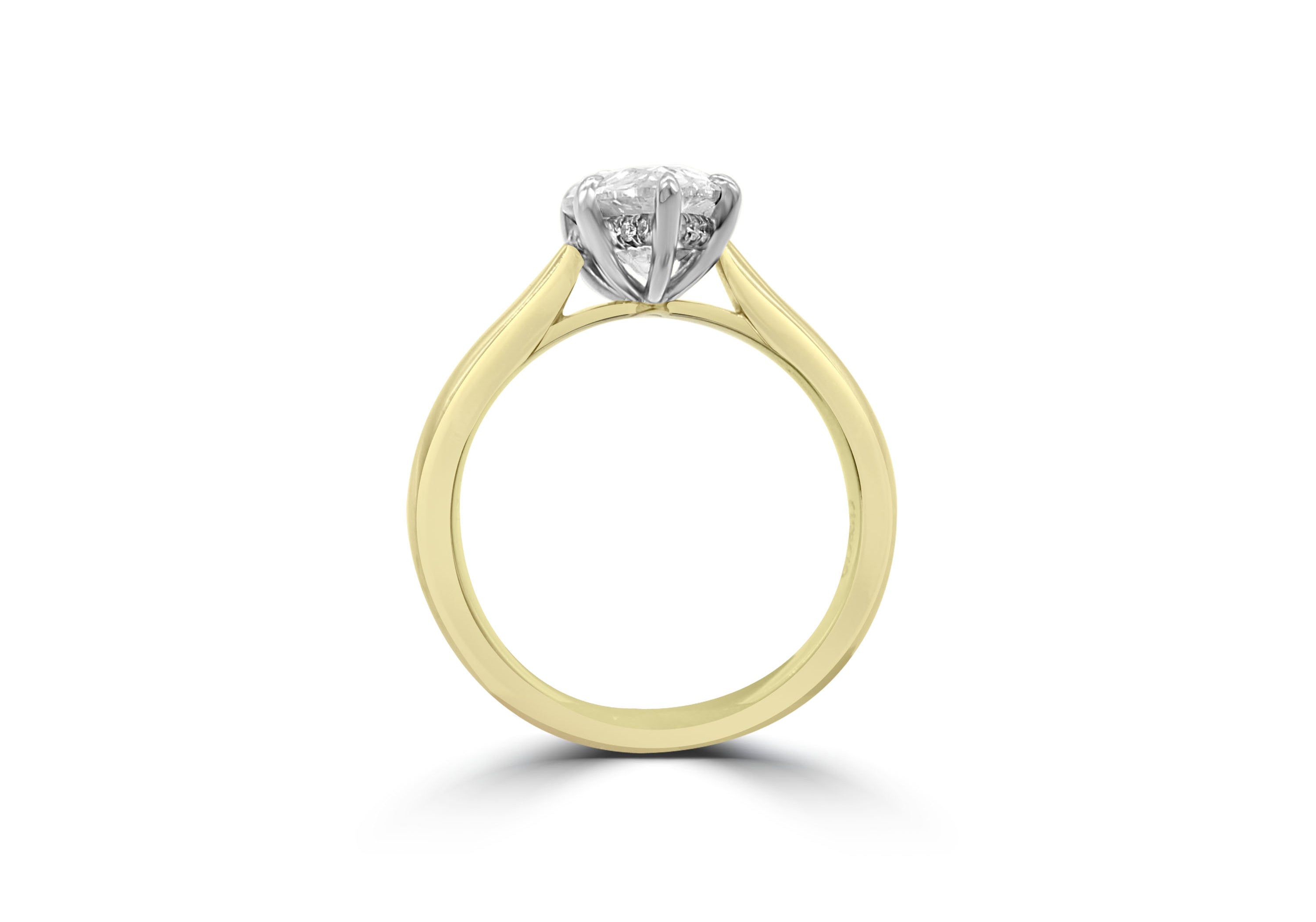 Pear Shape ring with hidden band of diamonds below the stone