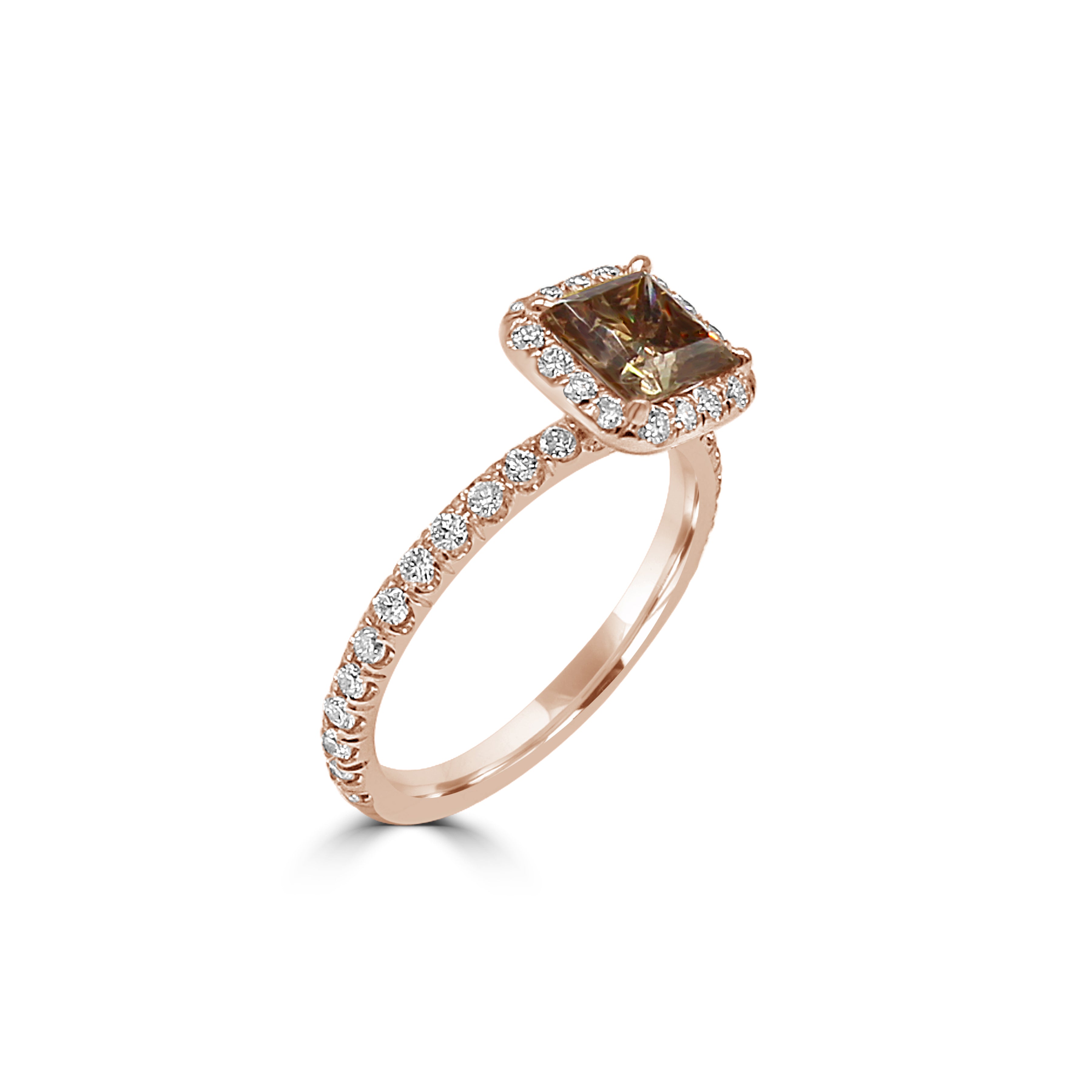  rose gold engagement ring with a fancy orangy-brown princess-cut diamond, surrounded by a sparkling diamond halo.






