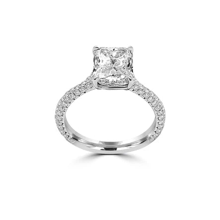 Diamond engagement ring. Center Radiant cut natural diamond, along with 3 rows of micro-pave diamonds on the band