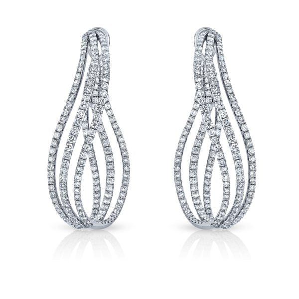 Three rows of intertwined wavelike elongated earrings